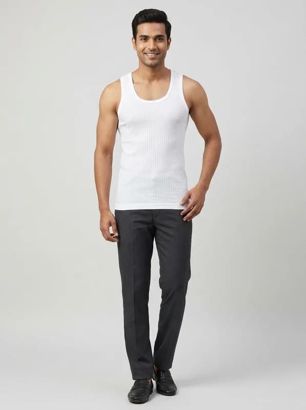 AI innerwear photo: white ribbed vest on a model with plain trousers, light grey studio background